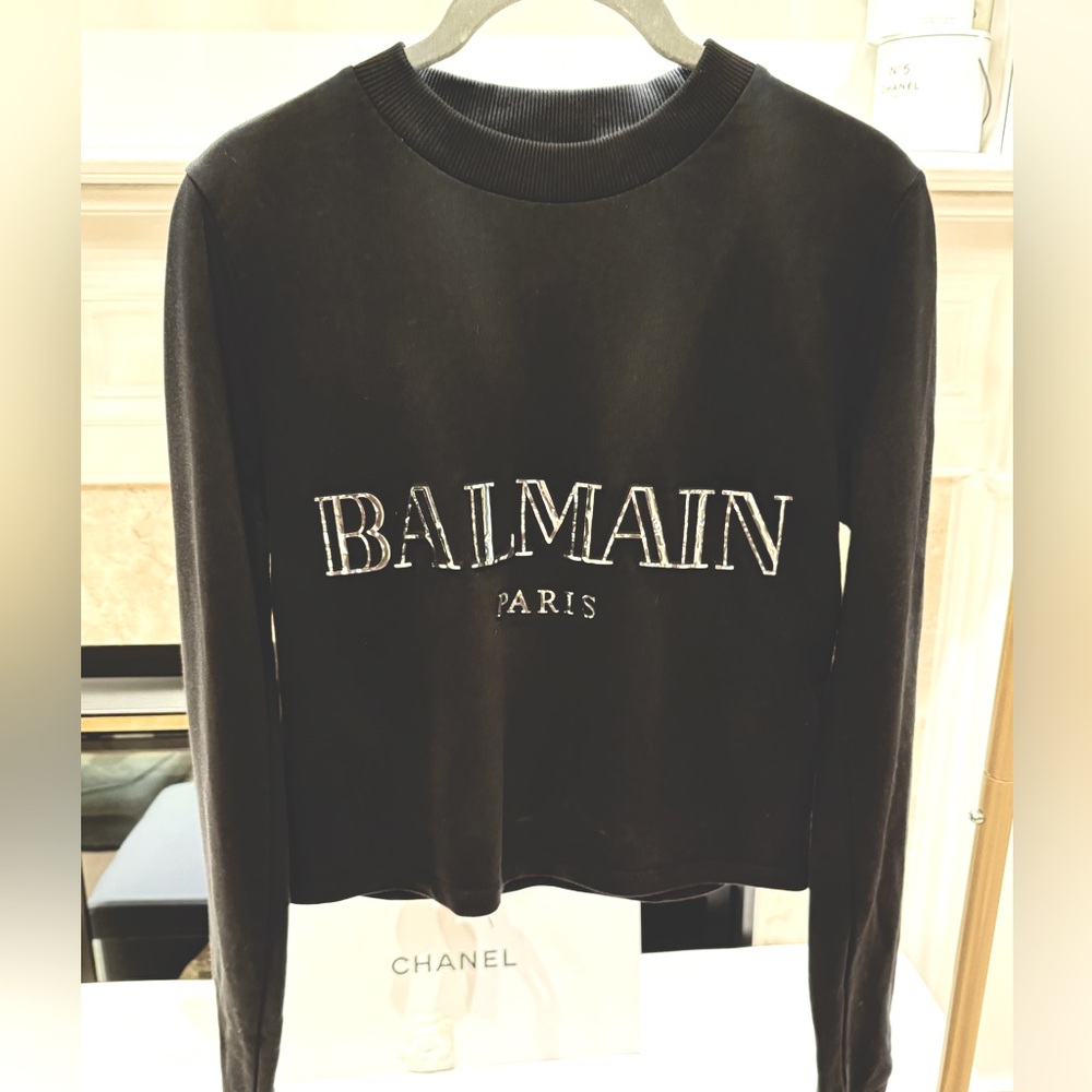 Balmain cropped sweater in black with silver in size 38.